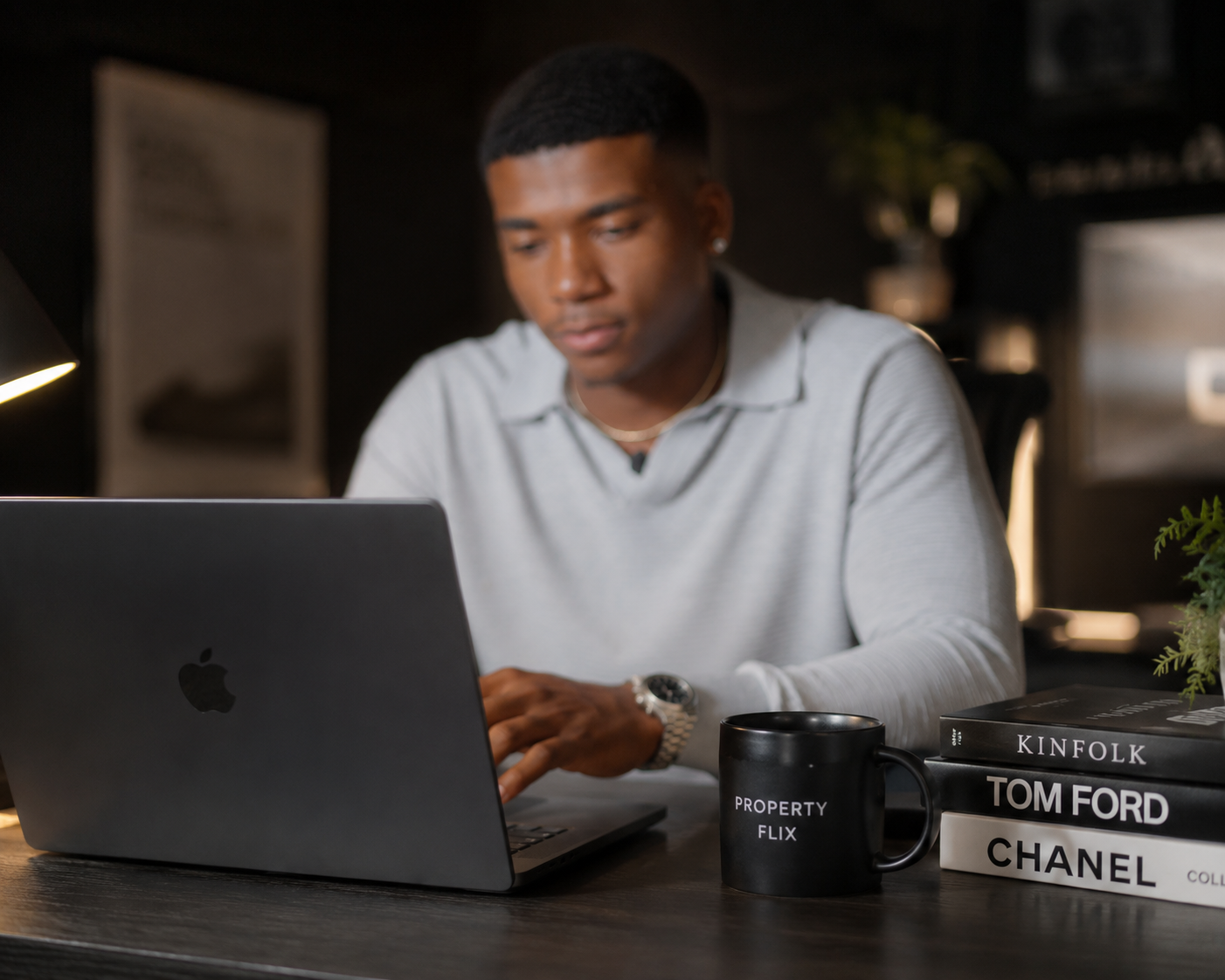 Agent working at a desk with a PropertyFlix mug